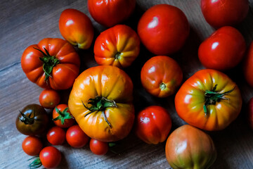 Variety of a group of red ripe organic tomatoes.