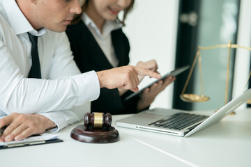 Lawyers sit for a meeting with the team at the law firm.