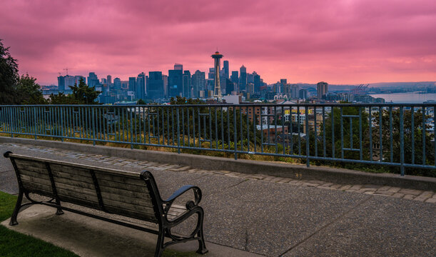 Seattle Skyline Cityscape Over The Wooden Bench In Kerry Park In Seattle, Washington State At Sunset