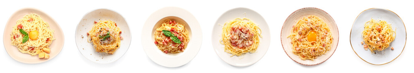 Plates with tasty pasta carbonara on white background, top view