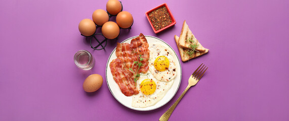 Composition with tasty fried eggs, bacon and toasts on violet background, top view