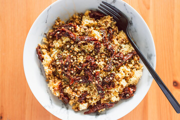 healthy plant-based food, vegan moroccan couscous with lentils and sundried tomatoes
