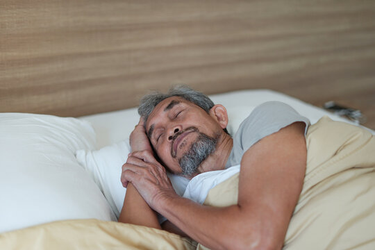 Senior Man Asleep On The Bed,older Adult Asian Man Sleeping Comfortably In Blanket. Concept Elderly People Lifestyle, Get Enough Rest,health Care