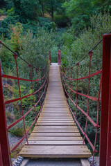 Fototapeta premium Suspension bridge on the Monachil cahorros route. Grenade. Spain