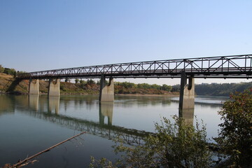 Fototapeta na wymiar bridge over river, Gold Bar Park, Edmonton, Alberta