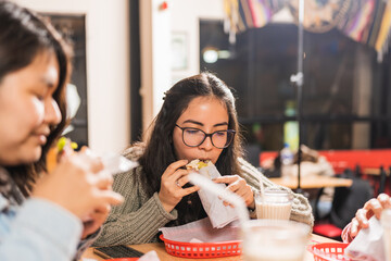 Women enjoying mexican food in a restaurant
