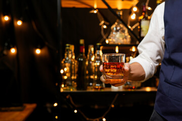Bartender pouring Whiskey, on  bar,