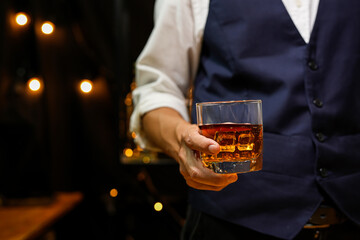 Bartender pouring Whiskey, on  bar,