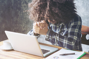 Hand praying with laptop, Church online Sunday services concept, Home church during quarantine...