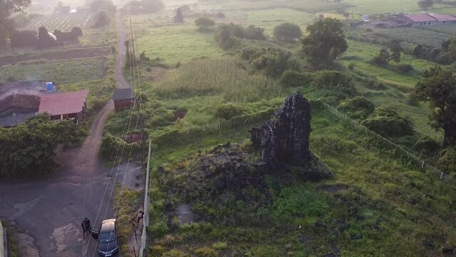 Visitors At The Site Of Religious Ruins In The Landscape Of Trimbakeshwar In Nashik, India. aerial drone orbit