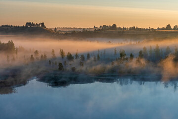 Foggy dawn in Izborsko-Malskaya Valley, Pskov region