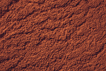 Terra cotta powder or overdried soil-like texture background - drought concept