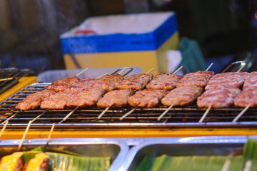 grill sour meatball in ho thi ky street, ho chi minh city