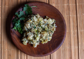 Xiguinha de cacana, a tradional dish from Mozambique, made of cassava root and mormodica balsamina leaves