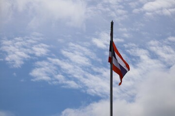 flag against blue sky