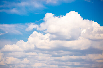 Beautiful clouds against the blue sky. Fluffy clouds, cloudy weather.