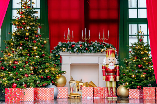 Theatre stage with new year decorations. Fireplace, Nutcracker. giftboxes. Celebration christmas performance for children and adults during winter holidays