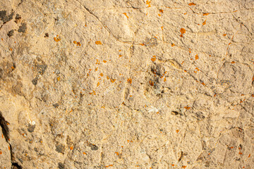 Background Stone wall, background with abstract stains of epoxy resin. Beautiful texture of marble and granite with stains, onyx surface. Finishing stone for furniture and interior. Acrylic stains