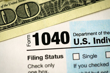 Form 1040 U.S. individual income tax return. Tax payment concept