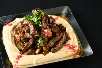 beef liver, served dry or with curry in a bowl, karahi or plate
