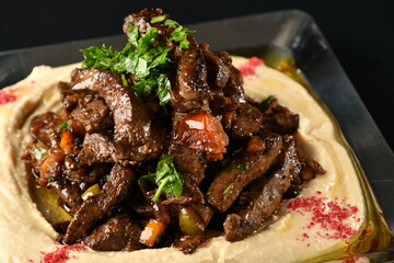 beef liver, served dry or with curry in a bowl, karahi or plate
