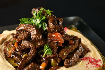 beef liver, served dry or with curry in a bowl, karahi or plate
