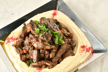 beef liver, served dry or with curry in a bowl, karahi or plate
