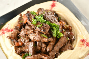 beef liver, served dry or with curry in a bowl, karahi or plate
