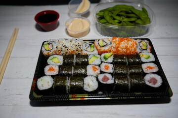 Set of sushi rolls on marble table