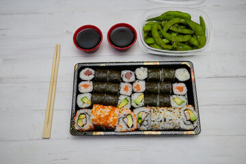 Set of sushi rolls on marble table