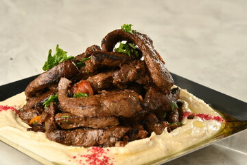 beef liver, served dry or with curry in a bowl, karahi or plate
