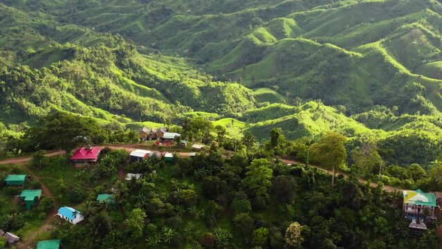 Drone shot of the mountain Lushai Heritage Village and Sajek valley on a sunny day