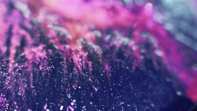 Abstract art piece. Glistening icy rock effect. Textured pink nave blue background