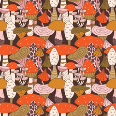 Hand drawn seamless pattern of mushroom and toadstools. Vector illustration for fabric or wrap paper design.