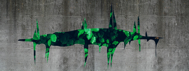green leaves through a crack in the concrete - concept of environmental sustainability and overbuilding