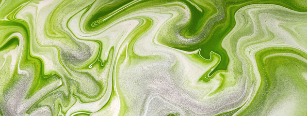 Abstract fluid art background light green and white colors. Liquid marble. Acrylic painting with silver gradient.