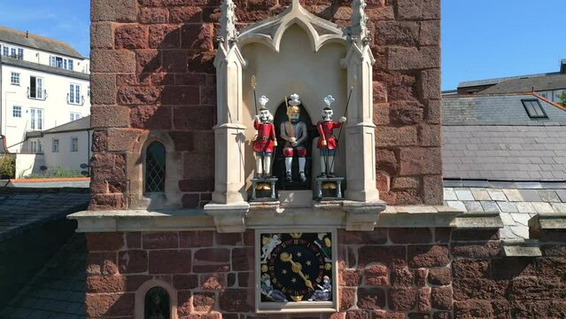 Clock Tower of Church of St Marys Steps in Exeter. One of the oldest Churches in Exeter. Drone Video. 30fps.