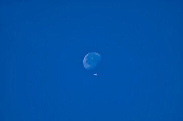 Plane cross the Moon 
