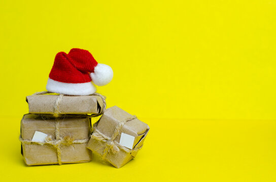 Gifts From Santa On A Yellow Background, New Year, Christmas, Background Image, Postcard