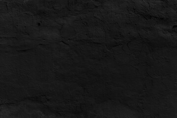 Fototapeta na wymiar OLd black concrete wall. Grunge background