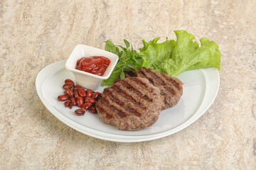 Grilled beef burger cutlet with sauce