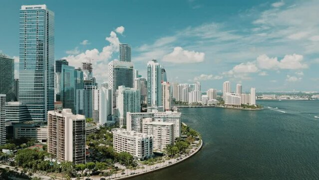 drone video of miami downtown with coastline and water