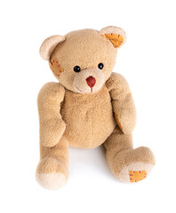 Obraz premium Toy teddy bear sitting on white background.