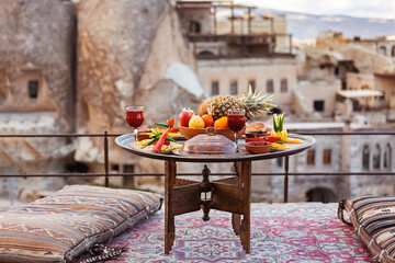 Lovely dinner served in Cappadocia at sunset overlooking the city.
