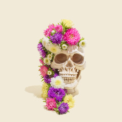 Realistic human skull with colorful flowers. Aesthetic Mexican Day of the Dead (Dia De Los Muertos)...