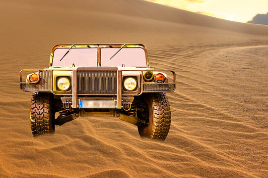 Humvee H1 Military Vehicle In Camouflage On A Dune In The Sand Of The Desert, Vehicle Location Lehnin, Germany, September 11, 2022.