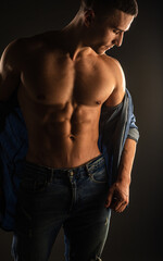 Fototapeta na wymiar Portrait of a guy posing topless
