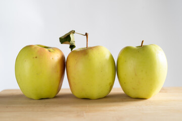 Apples on a wooden table
