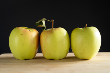 Apples on a wooden table