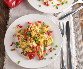 Scrambled eggs with vegetables on a plate